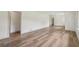 Expansive living area with light-colored wood floors, offering versatile layout options at 1261 Cliffwood Se Dr, Smyrna, GA 30080