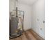 Utility room featuring the home's hot water heater and laundry hookups at 1261 Cliffwood Se Dr, Smyrna, GA 30080
