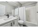 Clean bathroom featuring white cabinets, an updated sink, and tub shower combo at 2657 Albion Farm Way, Duluth, GA 30097