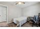 A bedroom features a ceiling fan, window and desk at 2657 Albion Farm Way, Duluth, GA 30097