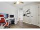 Home office features a large desk, shelving and natural light at 2657 Albion Farm Way, Duluth, GA 30097