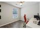Home office features a large desk and natural light at 2657 Albion Farm Way, Duluth, GA 30097