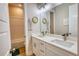 Bathroom with double vanity, a shower/bathtub, and modern fixtures at 3508 Cox Cemetery Rd, Social Circle, GA 30025