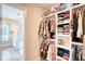 Walk-in closet provides ample space for storage and organization and connects to bathroom at 3508 Cox Cemetery Rd, Social Circle, GA 30025