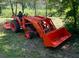 Kubota tractor on grassy lot at 3508 Cox Cemetery Rd, Social Circle, GA 30025