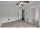 Bedroom with ceiling fan and an adjacent walk in closet at 3943 Alexandra Oak Ct, Suwanee, GA 30024