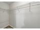 Walk-in closet features a white interior and wire shelving at 3943 Alexandra Oak Ct, Suwanee, GA 30024