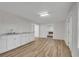 Versatile space with cabinets, a sink, and seamless transition to other areas at 3943 Alexandra Oak Ct, Suwanee, GA 30024