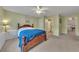 Spacious bedroom featuring a ceiling fan, carpet, and white trim at 503 Silver Maple Ln, Woodstock, GA 30189