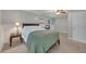 Bright and airy bedroom with grey walls, carpet, and a ceiling fan at 503 Silver Maple Ln, Woodstock, GA 30189