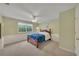Bright bedroom with large window and plush carpet, creating a cozy atmosphere at 503 Silver Maple Ln, Woodstock, GA 30189
