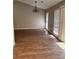 Bright, airy living room with a chandelier and large windows providing natural light at 861 Creek Trail Nw, Kennesaw, GA 30144