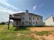 Exterior showcasing a deck, backyard, and the overall structure of the house at 132 Peggy Meadows Way, Douglasville, GA 30134