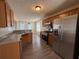 Well-equipped kitchen with stainless steel appliances and granite countertops at 132 Peggy Meadows Way, Douglasville, GA 30134