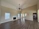 Spacious living room with high ceilings, fireplace, and wood-look floors at 132 Peggy Meadows Way, Douglasville, GA 30134