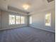 Bright bedroom with large windows and carpeted floors at 1996 Deco Dr, Kennesaw, GA 30144