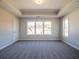 Bedroom with carpeted floor and multiple windows at 1996 Deco Dr, Kennesaw, GA 30144