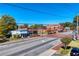 Street view of a charming town featuring multiple commercial buildings with unique architectural styles at 1996 Deco Dr, Kennesaw, GA 30144