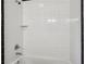 Bathroom featuring a shower over tub with white tile at 261 Elmira Ne Pl, Atlanta, GA 30307