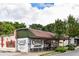 Candler Park Market featuring outdoor seating, mural, and signage, a neighborhood destination for deli and craft beer at 261 Elmira Ne Pl, Atlanta, GA 30307
