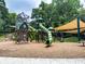 Community playground with multiple slides and climbing structures, perfect for Gathering fun and outdoor activities at 261 Elmira Ne Pl, Atlanta, GA 30307