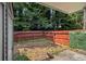 Cozy backyard area with a wooden fence, offering privacy and a tranquil outdoor space at 5575 Wells Circle, Stone Mountain, GA 30087