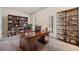Spacious office featuring built-in bookshelves and natural light at 6404 Brookside Se Blvd, Mableton, GA 30126