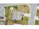 Aerial view of the property highlighting a fire pit and the home's location in a quiet neighborhood at 1998 Lakeview Bend Way, Buford, GA 30519