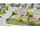Aerial view of a home with a fenced-in yard, firepit, deck, and surrounding neighborhood at 1998 Lakeview Bend Way, Buford, GA 30519