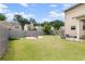 Large backyard with a cozy fire pit area and privacy fence, perfect for outdoor gatherings and relaxation at 1998 Lakeview Bend Way, Buford, GA 30519