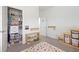 Bedroom featuring a closet and built in shelving over a colorful polka dot rug at 1998 Lakeview Bend Way, Buford, GA 30519