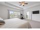 Bright bedroom with large windows overlooking the yard at 1998 Lakeview Bend Way, Buford, GA 30519