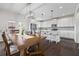 Open kitchen with large dining table perfect for entertaining at 1998 Lakeview Bend Way, Buford, GA 30519