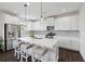 Modern kitchen featuring stainless steel appliances and white cabinets at 1998 Lakeview Bend Way, Buford, GA 30519