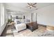 Bright living area with a comfortable sofa, hardwood floors, and an open concept layout at 1998 Lakeview Bend Way, Buford, GA 30519