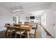 Open floorplan showcasing dining and living spaces with great natural light at 1998 Lakeview Bend Way, Buford, GA 30519