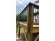 New wooden deck with railings and support beams at 2786 Knollview Dr, Decatur, GA 30034