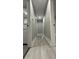 Hallway featuring neutral paint, modern flooring, and clean lines, creating a welcoming atmosphere at 2786 Knollview Dr, Decatur, GA 30034
