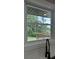 Kitchen window with a view of the backyard and deck at 2786 Knollview Dr, Decatur, GA 30034