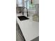 Kitchen sink with white quartz countertop and matte-black faucet at 2786 Knollview Dr, Decatur, GA 30034