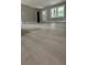 Spacious living room with gray walls and light-colored flooring at 2786 Knollview Dr, Decatur, GA 30034