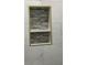 Recessed shower niche with decorative tile and gold trim in tiled shower at 2786 Knollview Dr, Decatur, GA 30034