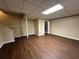 Finished basement with laminate flooring and a closet at 296 Hayes Trce, Hiram, GA 30141