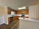 Modern kitchen with stainless appliances, plenty of storage, and a breakfast bar at 296 Hayes Trce, Hiram, GA 30141