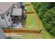 View of fenced backyard with covered patio and deck, providing a private outdoor living space at 406 Fernstone Dr, Canton, GA 30114