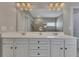 Bright bathroom with a double vanity and undermount sinks at 406 Fernstone Dr, Canton, GA 30114