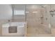 Bright bathroom featuring a tiled shower, soaking tub, and tiled walls at 406 Fernstone Dr, Canton, GA 30114