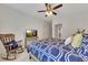 Bedroom with a bed and a rocking chair at 406 Fernstone Dr, Canton, GA 30114