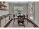Charming breakfast nook with natural light and modern decor at 406 Fernstone Dr, Canton, GA 30114