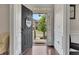 Stylish front door leading to a bright and airy foyer with gleaming hardwood floors at 406 Fernstone Dr, Canton, GA 30114